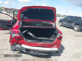 2022 Toyota Camry SE with VIN 4T1S11AK1NU052325, listed as a IAAI auction lot 41618906 with 64,632 mi miles and . Bid and sale history available at DreamBid. Image 6.