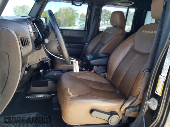 2013 Jeep Wrangler Unlimited Moab with VIN 1C4HJWEG7DL600043, listed as a Copart auction lot 52146945 with 118,882 mi miles and Salvage title. Bid and sale history available at DreamBid. Image 7.