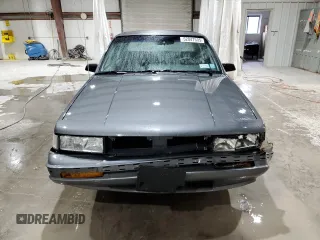 1991 Oldsmobile Cutlass Ciera with VIN 2G3AM54N8M2304905, listed as a Copart auction lot 52047535 with 28,749 mi miles and Salvage Title. Bid and sale history available at DreamBid. Image 5.