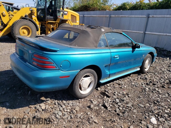 1994 Ford Mustang with VIN 1FALP4442RF186105, listed as a Copart auction lot 74677924 with 185,072 mi miles and Clean title. Bid and sale history available at DreamBid. Image 3.
