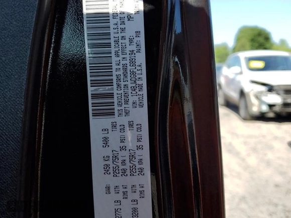 2015 Jeep Wrangler Unlimited Freedom with VIN 1C4BJWDG8FL689194, listed as a Copart auction lot 58016385 with 108,026 mi miles and Salvage title. Bid and sale history available at DreamBid. Image 12.