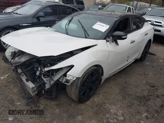 2017 Nissan Maxima Platinum with VIN 1N4AA6AP2HC412534, listed as a IAAI auction lot 41910678 with 140,675 mi miles and . Bid and sale history available at DreamBid. Image 2.