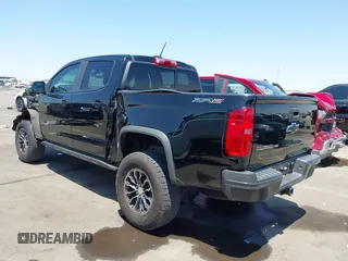 2018 Chevrolet Colorado 4WD ZR2 z VIN 1GCGTEEN5J1259764, wystawiony jako IAAI lot #42474810 z przebiegiem 111 187 mil mil oraz . Historia ofert i sprzedaży dostępna na DreamBid. Obrazek 3.