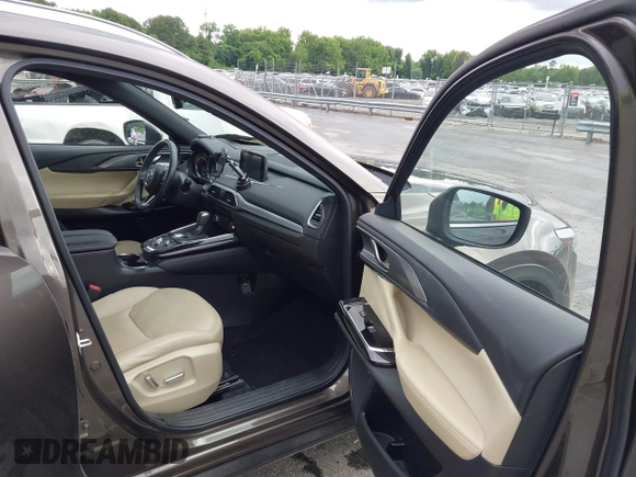 2016 Mazda CX-9 Grand Touring с VIN JM3TCADY6G0126391, выставлен на аукционе IAAI как лот 42242541 с пробегом 45 147 миль миль и . История ставок и продаж доступна на DreamBid. Изображение 5.