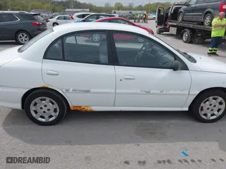 2002 Kia Rio with VIN KNADC123926185376, listed as a IAAI auction lot 42027348 with 84,893 mi miles. Bid and sale history available at carsss.com. Image 6.