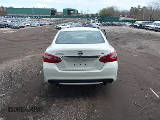 2018 Nissan Altima SR with VIN 1N4AL3APXJC283392, listed as a IAAI auction lot 41214643 with 126,720 mi miles and . Bid and sale history available at DreamBid. Image 16.
