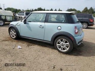 2013 MINI Hardtop S with VIN WMWSV3C52DT396033, listed as a Copart auction lot 61041585 with 83,873 mi miles and Salvage title. Bid and sale history available at DreamBid. Image 2.