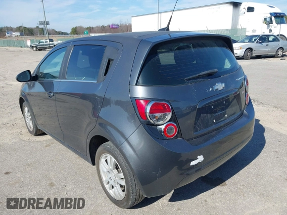 2013 Chevrolet Sonic LT with VIN 1G1JC6SB1D4164944, listed as a IAAI auction lot 41496975 with 96,987 mi miles. Bid and sale history available at carsss.com. Image 3.