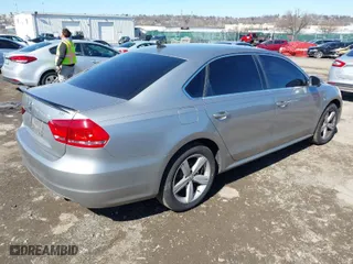 2014 Volkswagen Passat SE w/Sunroof with VIN 1VWBT7A38EC053078, listed as a IAAI auction lot 41832602 with 173,802 mi miles. Bid and sale history available at carsss.com. Image 4.