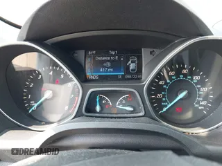 2014 Ford Escape SE z VIN 1FMCU9GX9EUC56559, wystawiony jako IAAI lot #42386594 z przebiegiem 98 722 mil mil oraz . Historia ofert i sprzedaży dostępna na DreamBid. Obrazek 7.