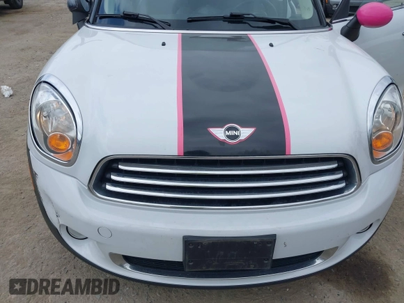 2014 MINI Countryman with VIN WMWZB3C5XEWR37594, listed as a IAAI auction lot 42500466 with 67,589 mi miles and . Bid and sale history available at DreamBid. Image 6.