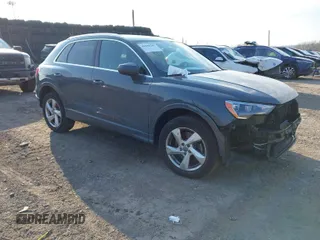 2020 Audi Q3 Premium with VIN WA1AECF37L1071150, listed as a IAAI auction lot 41698945 with 47,821 mi miles. Bid and sale history available at carsss.com. Image 1.