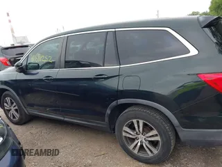 2016 Honda Pilot EX-L with VIN 5FNYF6H59GB100369, listed as a IAAI auction lot 42684252 with 146,609 mi miles and . Bid and sale history available at DreamBid. Image 14.
