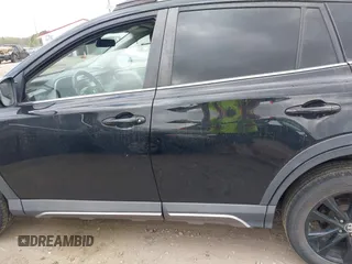 2018 Toyota RAV4 XLE with VIN 2T3RFREV1JW697044, listed as a IAAI auction lot 41891412 with 140,145 mi miles. Bid and sale history available at carsss.com. Image 15.