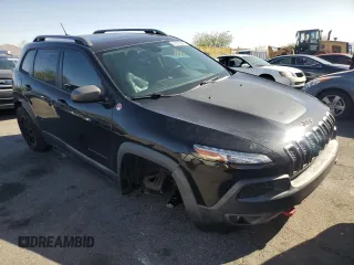 2015 Jeep Cherokee Trailhawk with VIN 1C4PJMBS8FW699319, listed as a Copart auction lot 61612245 with 173,581 mi miles and Clean title. Bid and sale history available at DreamBid. Image 4.