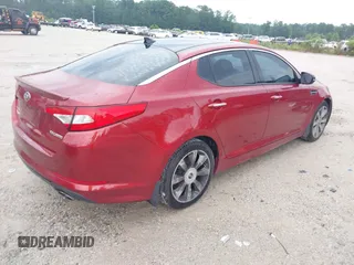 2013 Kia Optima SX z VIN 5XXGR4A6XDG133352, wystawiony jako IAAI lot #42899524 z przebiegiem 203 378 mil mil oraz . Historia ofert i sprzedaży dostępna na DreamBid. Obrazek 4.
