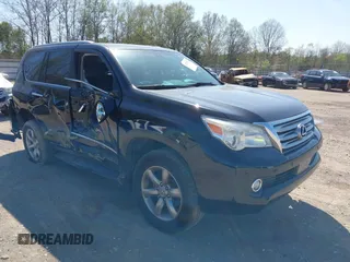 2013 Lexus GX 460 Premium z VIN JTJJM7FX8D5063276, wystawiony jako IAAI lot #41922536 z przebiegiem 162 110 mil mil oraz . Historia ofert i sprzedaży dostępna na DreamBid. Obrazek 1.