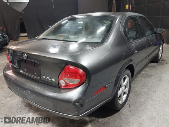 2001 Nissan Maxima SE with VIN JN1CA31A91T112866, listed as a IAAI auction lot 42372546 with 156,069 mi miles and . Bid and sale history available at DreamBid. Image 4.