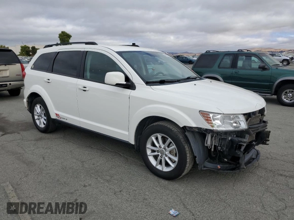 2015 Dodge Journey SXT with VIN 3C4PDCBGXFT743372, listed as a Copart auction lot 65270895 with 119,593 mi miles and Salvage title. Bid and sale history available at DreamBid. Image 4.