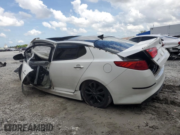 2015 Kia Optima EX z VIN 5XXGN4A70FG481037, wystawiony jako Copart lot #63845355 z przebiegiem Nie podano mil oraz Szkoda całkowita • Salvage title. Historia ofert i sprzedaży dostępna na DreamBid. Obrazek 2.