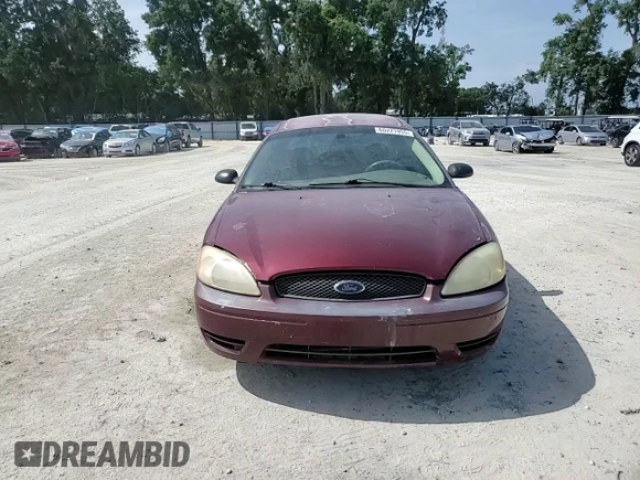 2007 Ford Taurus SE with VIN 1FAFP53U17A151246, listed as a Copart auction lot 60221955 with 284,321 mi miles and Salvage title. Bid and sale history available at DreamBid. Image 14.