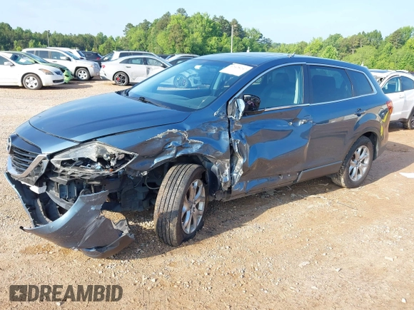 2014 Mazda CX-9 Touring with VIN JM3TB3CV7E0435659, listed as a IAAI auction lot 42428247 with 124,523 mi miles and . Bid and sale history available at DreamBid. Image 17.