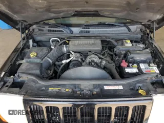 2006 Jeep Commander z VIN 1J8HG48K16C195599, wystawiony jako Copart lot #59402935 z przebiegiem 184 157 mil mil oraz Szkoda całkowita • Salvage title. Historia ofert i sprzedaży dostępna na DreamBid. Obrazek 11.