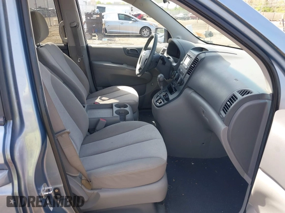2011 Kia Sedona LX with VIN KNDMG4C74B6368551, listed as a IAAI auction lot 42022483 with 172,495 mi miles. Bid and sale history available at carsss.com. Image 5.