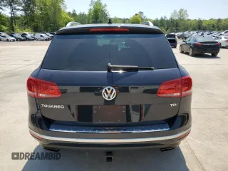 2015 Volkswagen Touareg Lux z VIN WVGEP9BP2FD006802, wystawiony jako Copart lot #52291965 z przebiegiem 122 787 mil mil oraz Szkoda całkowita • Salvage title. Historia ofert i sprzedaży dostępna na DreamBid. Obrazek 6.
