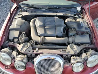 2000 Jaguar S-Type V8 z VIN SAJDA01D7YGL57521, wystawiony jako Copart lot #84539364 z przebiegiem Nie podano mil oraz Szkoda całkowita • Salvage title. Historia ofert i sprzedaży dostępna na DreamBid. Obrazek 11.