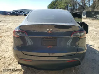 2025 Tesla Model Y Long Range with VIN 7SAYGDEE7SA345301, listed as a Copart auction lot 46693835 with 1,733 mi miles and Salvage Title. Bid and sale history available at carsss.com. Image 6.