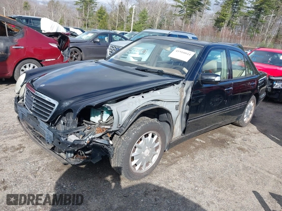 2000 Mercedes-Benz E-Class with VIN WDBJF82J2YX037818, listed as a IAAI auction lot 41910044 with 163,240 mi miles. Bid and sale history available at carsss.com. Image 2.