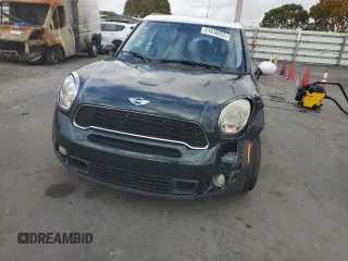 2013 MINI Countryman S ALL4 z VIN WMWZC5C58DWP31357, wystawiony jako Copart lot #51438035 z przebiegiem 98 138 mil mil oraz Szkody całkowita. Historia ofert i sprzedaży dostępna na DreamBid. Obrazek 5.
