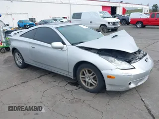2001 Toyota Celica GT with VIN JTDDR32T410098001, listed as a IAAI auction lot 41820456 with 239,296 mi miles. Bid and sale history available at carsss.com. Image 1.