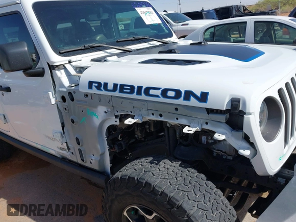 2023 Jeep Wrangler Rubicon with VIN 1C4JJXR63PW580370, listed as a IAAI auction lot 42017282 with 31,823 mi miles and . Bid and sale history available at DreamBid. Image 6.