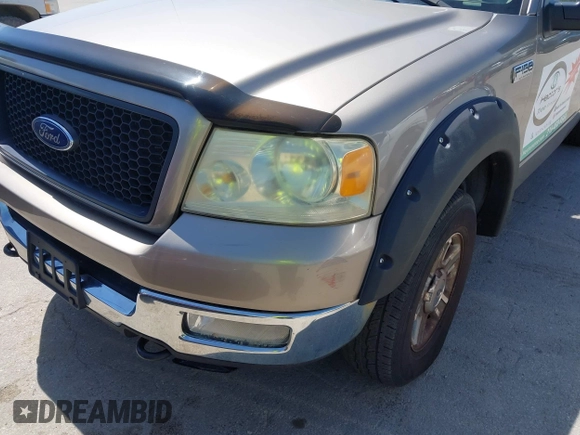 2005 Ford F-150 XLT with VIN 1FTPX14535FB40621, listed as a IAAI auction lot 42130458 with 122,764 mi miles. Bid and sale history available at carsss.com. Image 6.