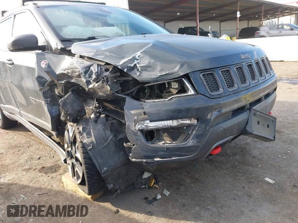 2017 Jeep Compass Trailhawk with VIN 3C4NJDDBXHT657425, listed as a IAAI auction lot 41022289 with 83,003 mi miles and . Bid and sale history available at DreamBid. Image 6.