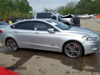 2019 Ford Fusion Titanium with VIN 3FA6P0D91KR187109, listed as a IAAI auction lot 41646320 with 107,125 mi miles. Bid and sale history available at carsss.com. Image 13.