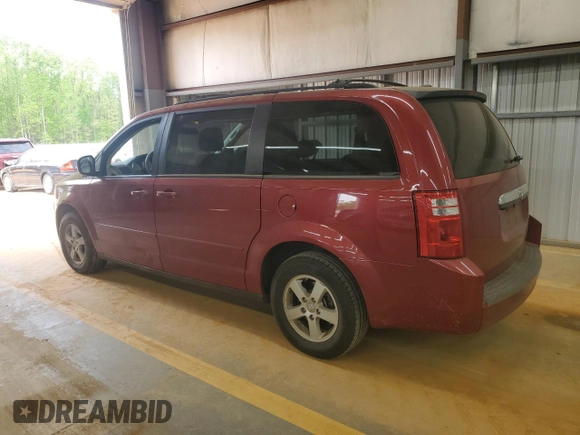 2010 Dodge Grand Caravan Hero with VIN 2D4RN3D11AR440333, listed as a Copart auction lot 53048205 with 198,991 mi miles and Salvage Title. Bid and sale history available at DreamBid. Image 2.