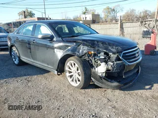 2018 Ford Taurus Limited z VIN 1FAHP2J89JG101051, wystawiony jako IAAI lot #40966879 z przebiegiem 86 748 mil mil oraz . Historia ofert i sprzedaży dostępna na DreamBid. Obrazek 1.