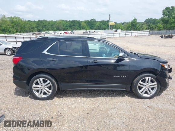2021 Chevrolet Equinox Premier with VIN 2GNAXNEV5M6151910, listed as a IAAI auction lot 42110010 with 45,911 mi miles and . Bid and sale history available at DreamBid. Image 14.