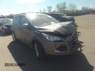 2013 Ford Escape SEL with VIN 1FMCU9H9XDUB32041, listed as a IAAI auction lot 36310371 with 99,560 mi miles. Bid and sale history available at carsss.com. Image 1.
