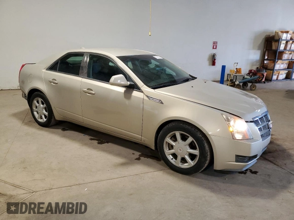 2009 Cadillac CTS RWD w/1SA with VIN 1G6DF577890147893, listed as a Copart auction lot 77416424 with 102,917 mi miles and Salvage Title. Bid and sale history available at carsss.com. Image 4.