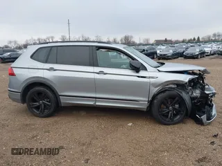 2023 Volkswagen Tiguan SE R-Line Black with VIN 3VV8B7AX3PM130610, listed as a IAAI auction lot 42011131 with 21,980 mi miles and . Bid and sale history available at DreamBid. Image 13.
