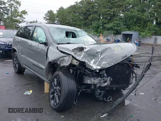2021 Jeep Grand Cherokee Laredo X with VIN 1C4RJFAG2MC589415, listed as a IAAI auction lot 42514387 with 66,033 mi miles and . Bid and sale history available at DreamBid. Image 6.