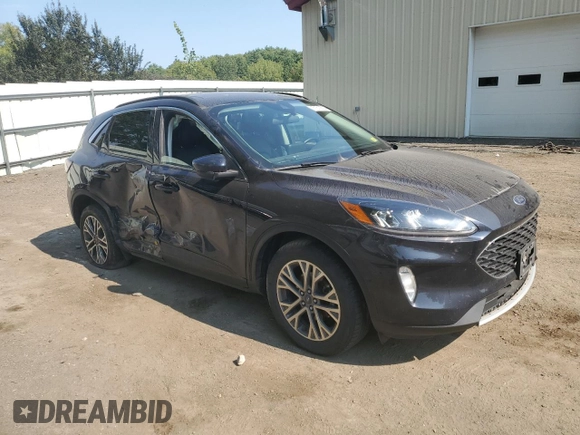 2021 Ford Escape SEL Hybrid z VIN 1FMCU9CZ7MUA94260, wystawiony jako Copart lot #71013514 z przebiegiem Nie podano mil oraz Szkoda całkowita • Salvage title. Historia ofert i sprzedaży dostępna na DreamBid. Obrazek 4.