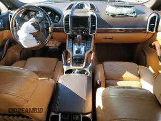 2012 Porsche Cayenne S z VIN WP1AB2A29CLA43084, wystawiony jako Copart lot #53424175 z przebiegiem Nie podano mil oraz Szkody całkowita. Historia ofert i sprzedaży dostępna na DreamBid. Obrazek 8.