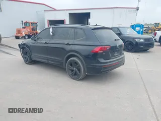 2023 Volkswagen Tiguan SE R-Line Black with VIN 3VVCB7AX1PM106543, listed as a IAAI auction lot 41784559 with 39,846 mi miles and . Bid and sale history available at DreamBid. Image 3.