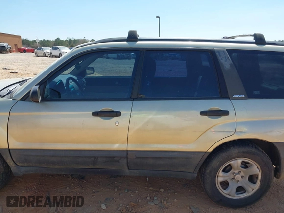 2003 Subaru Forester X z VIN JF1SG63613H715162, wystawiony jako IAAI lot #41897812 z przebiegiem 163 895 mil mil oraz . Historia ofert i sprzedaży dostępna na DreamBid. Obrazek 14.