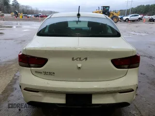 2023 Kia Rio LX with VIN 3KPA24ADXPE615843, listed as a Copart auction lot 47660125 with 27,841 mi miles and Salvage Title. Bid and sale history available at DreamBid. Image 6.